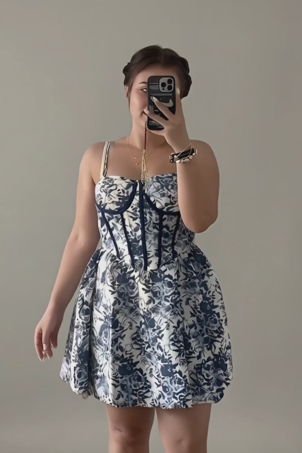 Video lookbook of the floral corset dress demonstrating fabric drape, structural integrity, and ease of movement.