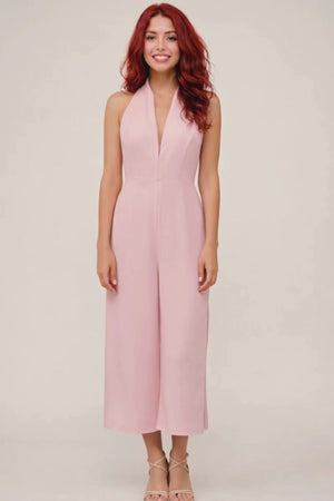 Video walkthrough of the halter jumpsuit construction, focusing on fabric movement, neckline pleats, and zipper finish.